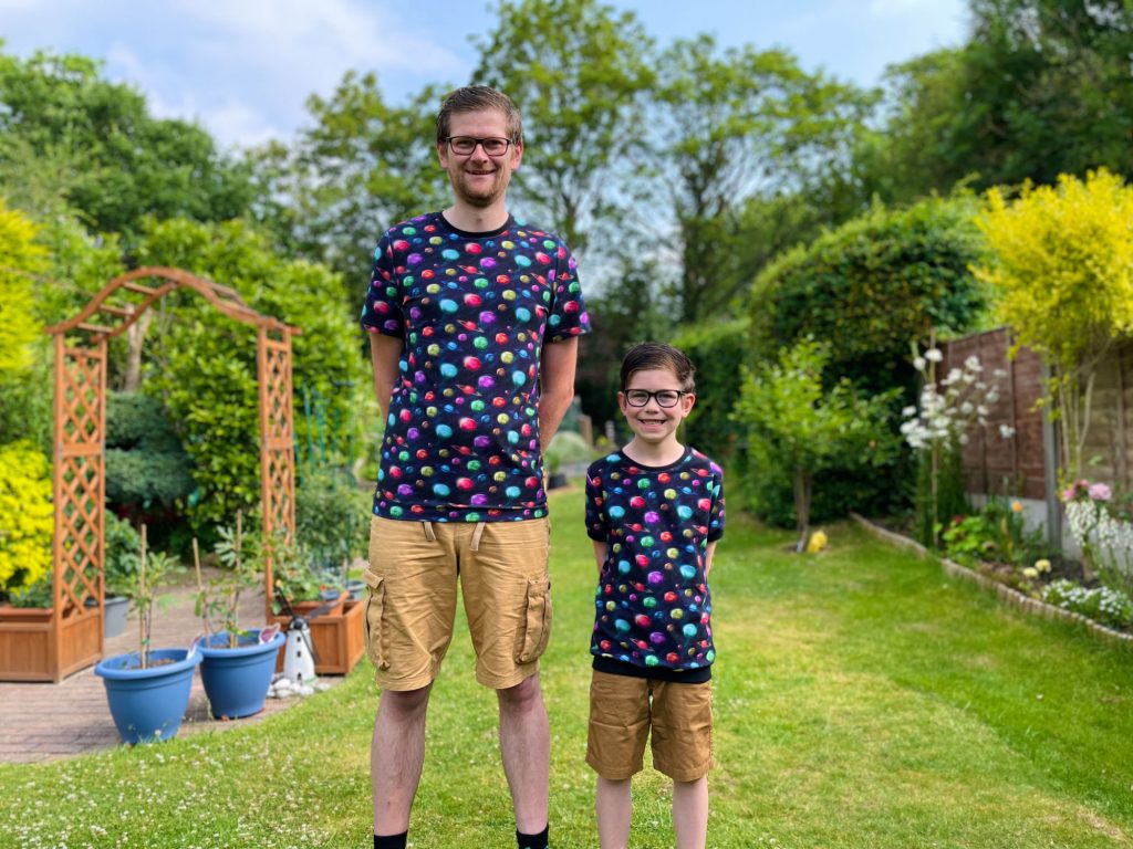 Matching daddy and child t-shirts made from cotton jersey featuring planets